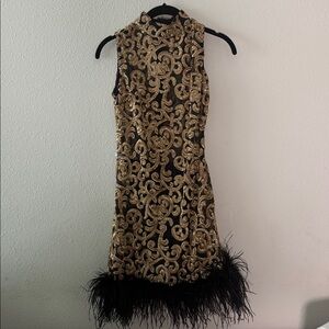 Elegant Gold and Black Sleeveless Dress with Feather Hem